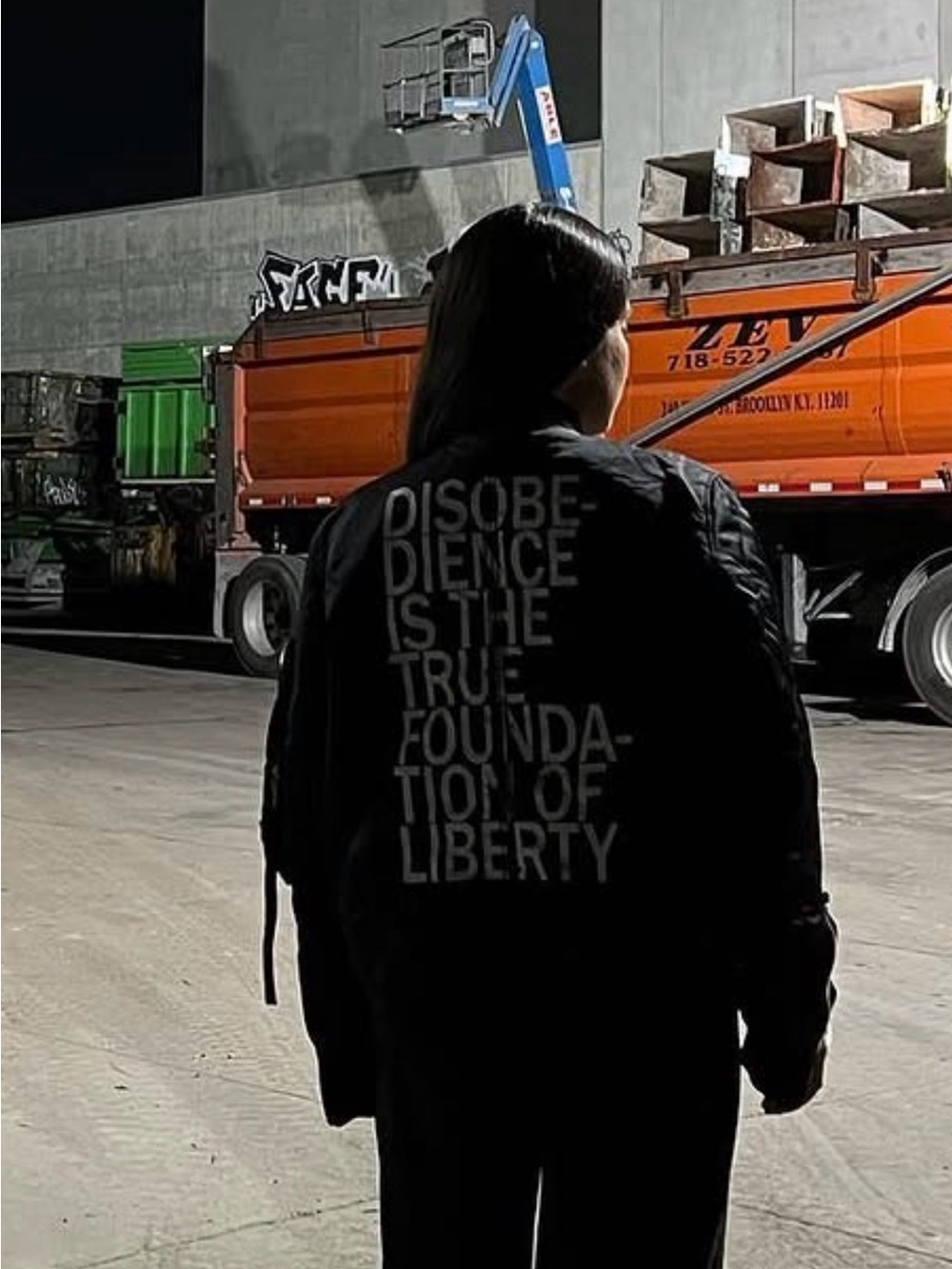 Black Bomber Jacket with White Slogan Back
